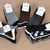 /product-detail/autumn-and-winter-new-men-s-socks-wholesale-stalls-selling-blended-solid-color-korea-foreign-trade-cotton-business-socks-custom-50046122446.html