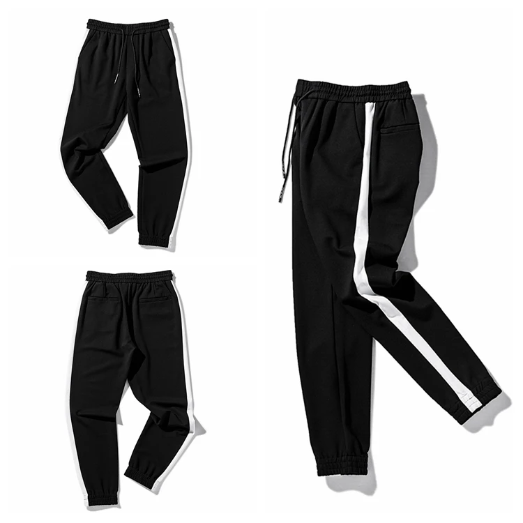 white sports track pants