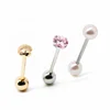 Trending women jewelry set of golden shell tongue piercing barbell