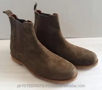 green leather chelsea boots