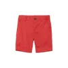 Shorts in woven cotton fabric with an adjustable elasticized waistband and zip fly with button. Side pocket