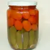 Pickled tomato and cucumber assorty in glass jar
