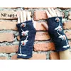 Hand knitted wrist warmers/mittens from Nepal . Made from 100% merino wool.