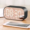 Creative wireless multi-function mirror bluetooth wireless charging alarm clock TF card bluetooth speaker