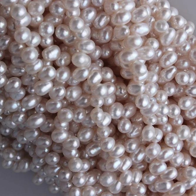 
4-4.5mm Fat Rice Shape White Colour Natural Freshwater Loose Pearl Strand, 16