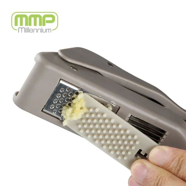 Garlic Press Slicer With Spiked Cleaning Attachment Mmp - Buy 2 In 1