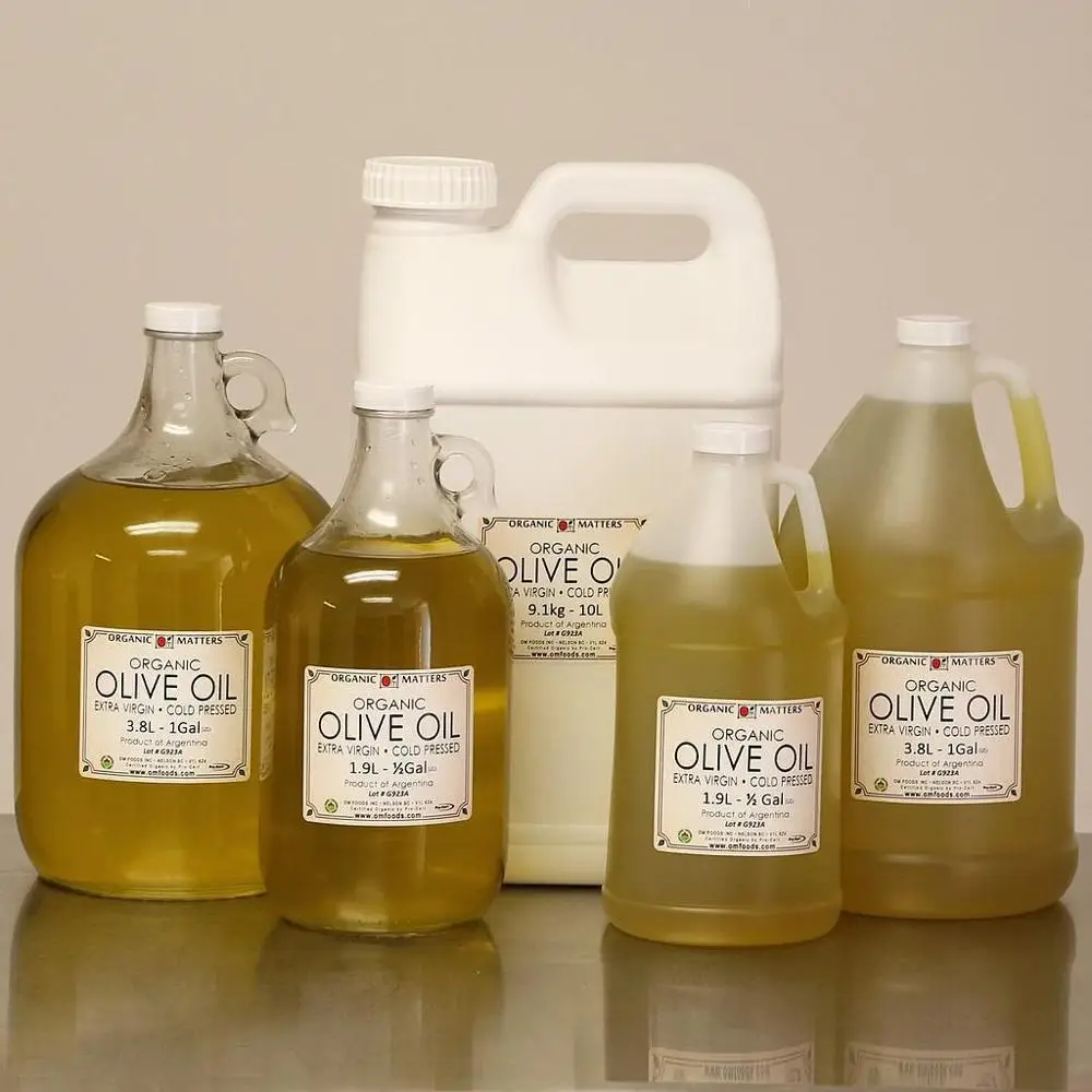 Extra Pomace Olive Oil в бутылке. Африка масло в ПЭТ бутылках. Масло в бутылке с чесноком. Масло 1 35